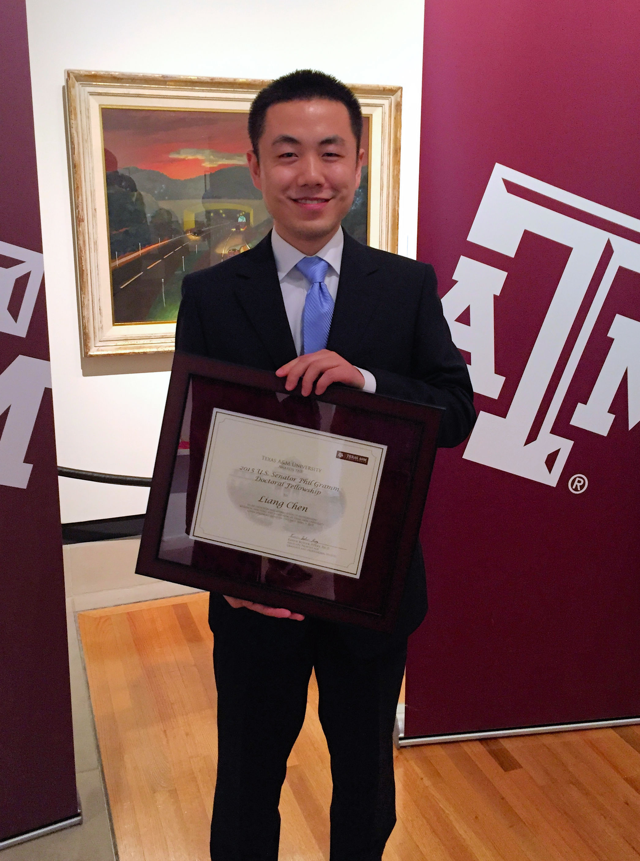  Liang Chen Wins Paper of the Year Award